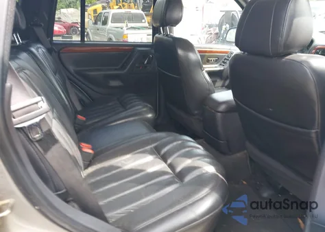 1999 Jeep Grand Cherokee Limited from USA, damaged, VIN 1J4GW68N9XC808639